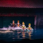 Water puppet performers showcasing traditional Vietnamese storytelling